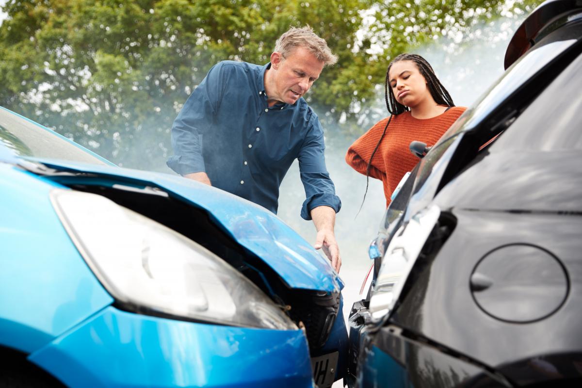 two motorists reacting to car accident