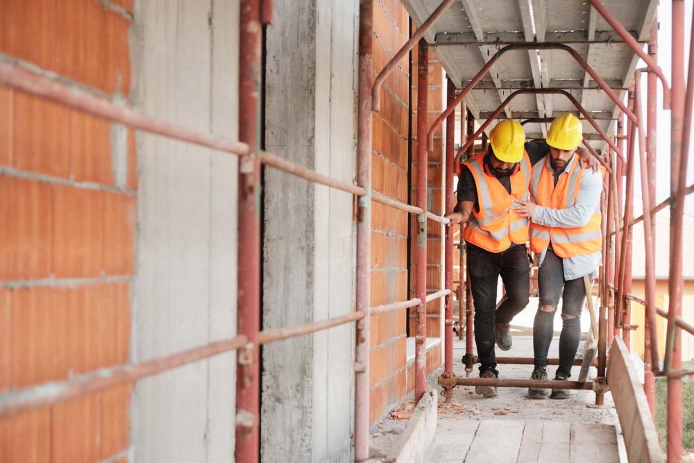 Injured worker on a workplace in construction