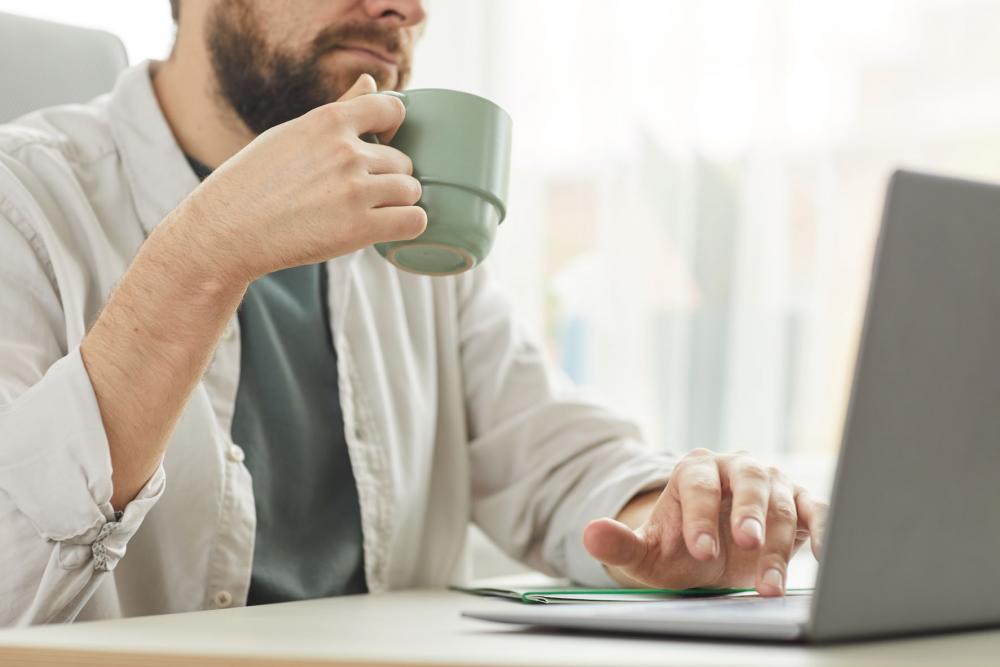 man working from home on laptop