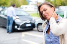 Woman neck hurt after car crash on the street