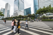 Pedestrians Using Crosswalk in City